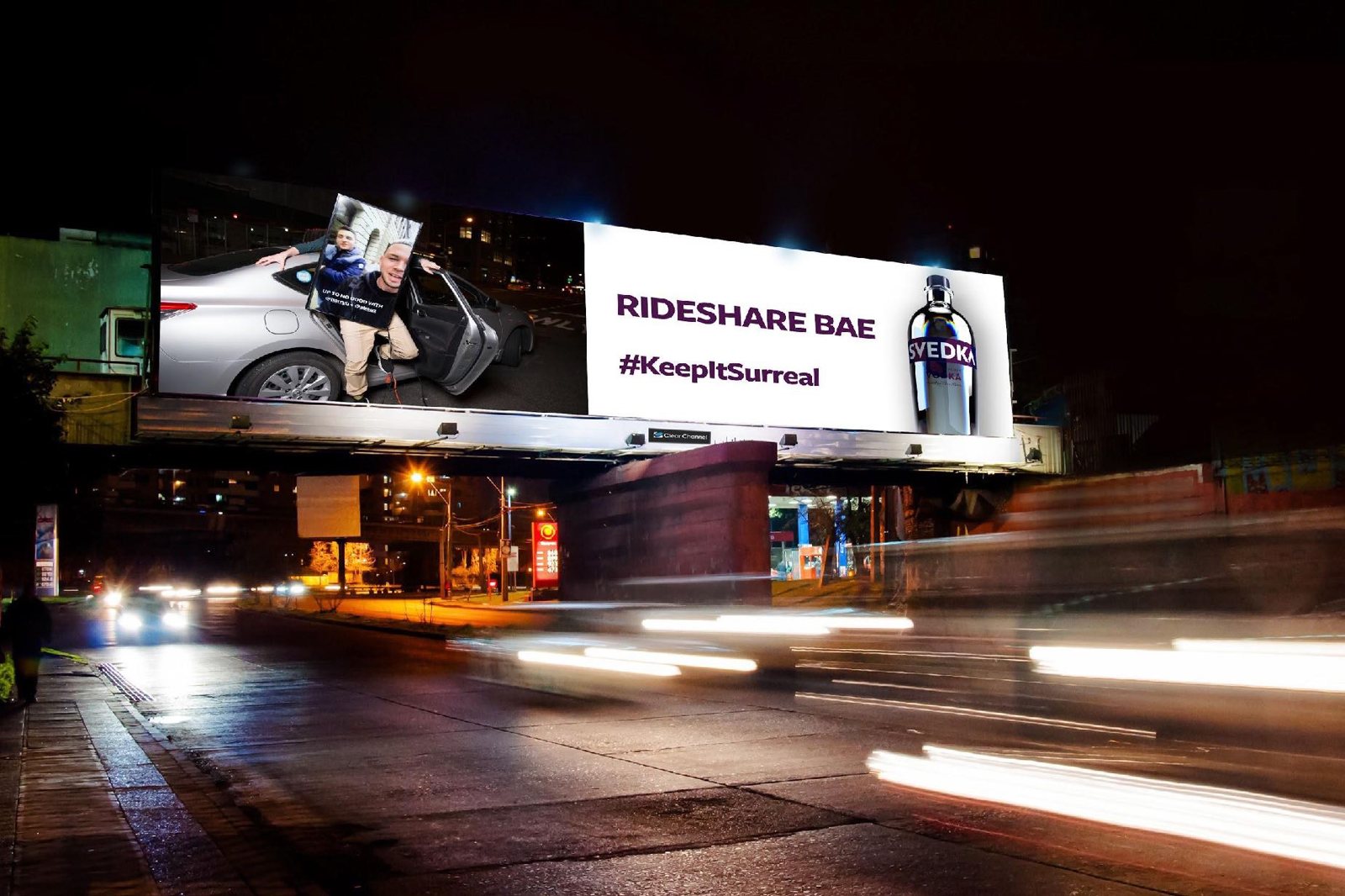 billboard at night: rideshare bae, #keepitsurreal